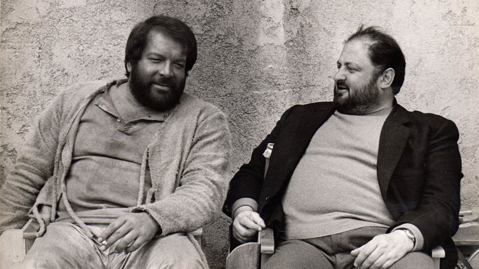 Actor Bud Spencer (left) and Italo Zingarelli take a break on the set of <em>They Call Me Trinity</em>.